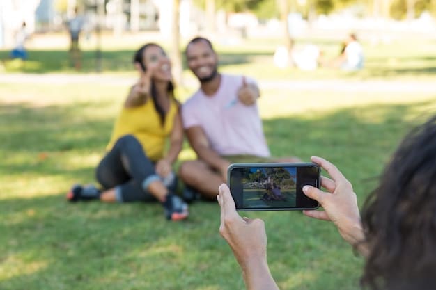 A group of diverse people playing a multiplayer mobile game at a park, with seamless connectivity indicated by a 5G symbol, highlighting the social and connected aspects of 5G-enabled mobile gaming.