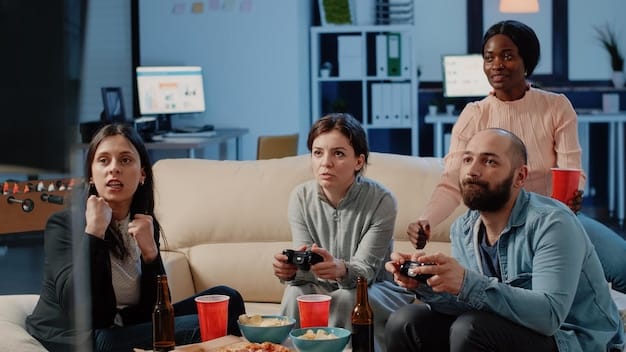 A behind-the-scenes shot of game developers discussing and playtesting a level of their upcoming game. The image captures a collaborative environment with multiple screens displaying different aspects of the game, highlighting the teamwork and attention to detail involved in game development.