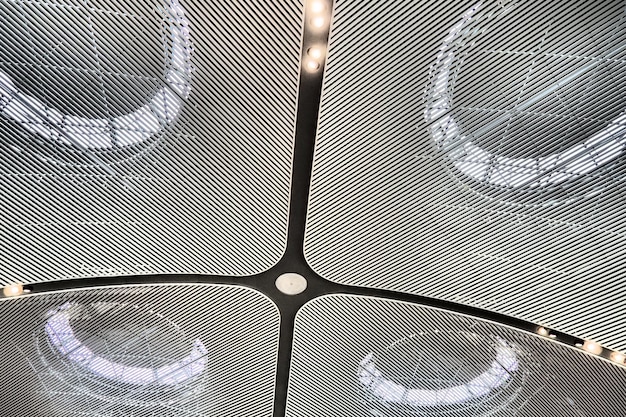 A close-up of a haptic feedback suit, showcasing the intricate network of sensors and actuators. Focus on the texture and material of the suit, highlighting its comfort and advanced technology.