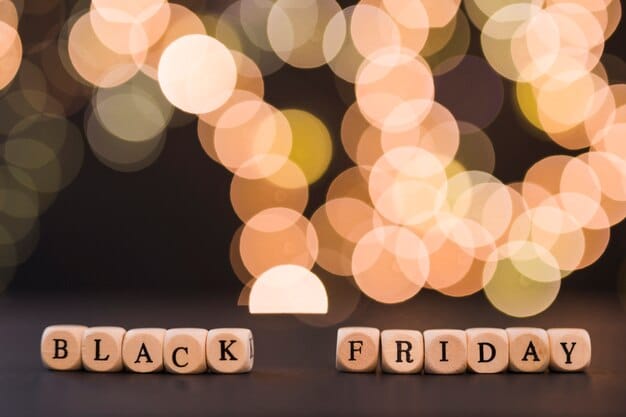 A calendar with circles around major sales events like Steam Summer Sale, Black Friday, and Christmas sales, emphasizing the importance of waiting for these events to buy PC games at discounted prices.