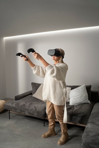 A person holding VR controllers stands in front of their PC setup, which includes the VR headset and base stations. They have different types of VR controllers on display.