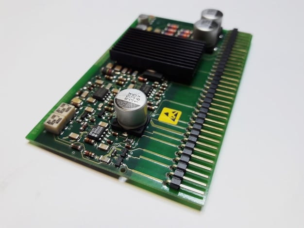A detailed close-up of various integrated circuits (ICs) and components on a sound card, highlighting the advanced audio processing technology. The PCB is clearly visible with traces and soldering points.