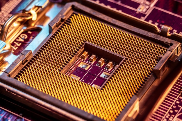 A close-up of a modern CPU installed in a motherboard socket, surrounded by RAM sticks and heatsinks, highlighting intricate circuitry and powerful components.